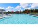 Refreshing community pool with plenty of lounge chairs at 532 Vervain Drive, Locust Grove, GA 30248