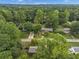 House nestled in a wooded neighborhood with treetop views at 3569 Briar Dr, Lithia Springs, GA 30122