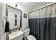 Clean bathroom with a shower/tub combo and vanity at 3569 Briar Dr, Lithia Springs, GA 30122