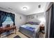 Relaxing bedroom with a king-size bed and plenty of light at 3569 Briar Dr, Lithia Springs, GA 30122