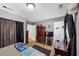 Spacious bedroom with a king-size bed and ensuite access at 3569 Briar Dr, Lithia Springs, GA 30122