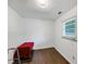 Bright bedroom with hardwood floors and a large window at 3569 Briar Dr, Lithia Springs, GA 30122
