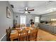 Kitchen dining area with wood table and chairs, hardwood floors at 3569 Briar Dr, Lithia Springs, GA 30122