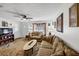 Spacious living room with neutral decor, comfy seating and hardwood floors at 3569 Briar Dr, Lithia Springs, GA 30122