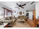 Spacious living room with hardwood floors and neutral color palette at 3569 Briar Dr, Lithia Springs, GA 30122