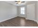 Bedroom with hardwood floors and ceiling fan at 1794 Spring Ne St, Conyers, GA 30012