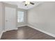 Bright bedroom with hardwood floors and ceiling fan at 1794 Spring Ne St, Conyers, GA 30012