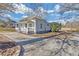Newly renovated cottage with a spacious driveway and side yard at 1794 Spring Ne St, Conyers, GA 30012