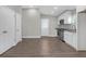 Modern kitchen with white cabinets, granite counters and stainless steel appliances at 1794 Spring Ne St, Conyers, GA 30012