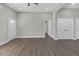 Spacious living room with hardwood floors, neutral walls and plenty of natural light at 1794 Spring Ne St, Conyers, GA 30012