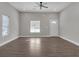 Spacious living room with hardwood floors, neutral walls and plenty of natural light at 1794 Spring Ne St, Conyers, GA 30012