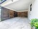 Covered carport featuring a sleek, modern wooden screen at 970 Fairburn Nw Rd, Atlanta, GA 30331