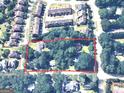 Aerial view showing a large lot surrounded by trees and neighboring houses at 00 Park Se Ave, Smyrna, GA 30080