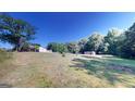 Large backyard with open space and trees at 5110 Macland Rd, Powder Springs, GA 30127