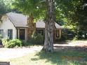 House exterior showcasing stonework and landscaping at 960 Stone Mountain Lithonia Rd, Lithonia, GA 30058