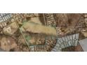 Large lot of land available for sale, near several homes and roads at 433 Mount Moriah Rd, Auburn, GA 30011