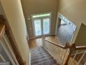 Elegant staircase leading to the upper level at 1221 Rhodes Sw Walk, Conyers, GA 30094