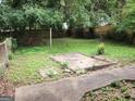 Large backyard, featuring a patio and grassy area at 988 Herndon Nw St, Atlanta, GA 30318