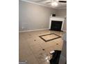 Living room with fireplace and tiled flooring at 449 Kara Ln, Mcdonough, GA 30253