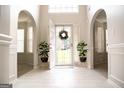 Bright and spacious entryway with tile flooring and large windows at 132 Sunflower Meadows Dr, Mcdonough, GA 30252