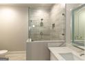 Modern bathroom with a large glass shower at 230 Waltham Way, Fayetteville, GA 30214