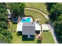 Home with pool and detached structure, large yard at 1969 Keys Ferry Rd, Mcdonough, GA 30252