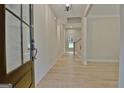 Bright entryway with hardwood floors and black door at 406 Lowery Rd, Grantville, GA 30220