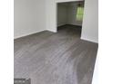 Spacious living room with gray carpeting at 1950 Wynhurst Xing, Stone Mountain, GA 30088