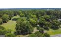 Aerial view showcasing the property's location and surrounding landscape at 1112 Harbins Rd, Dacula, GA 30019