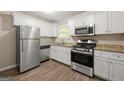 Updated kitchen with stainless steel appliances at 78 Candlelight Ln, Atlanta, GA 30331