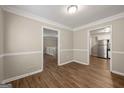 Dining room with hardwood floors and access to kitchen at 78 Candlelight Ln, Atlanta, GA 30331