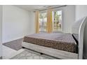 Bright bedroom with a double bed and neutral decor at 3290 Stock Saddle Pl, Cumming, GA 30040