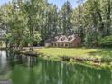 Ranch home with private pond access at 3110 Highway 20 W, Hampton, GA 30228
