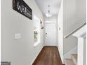 Bright and spacious entryway with hardwood floors and staircase at 1705 Labonte Pkwy, Mcdonough, GA 30253