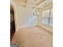 Bright dining room features recessed lighting and neutral carpeting at 700 Emporia Loop, Mcdonough, GA 30253