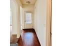 Bright entryway with hardwood floors and neutral walls at 700 Emporia Loop, Mcdonough, GA 30253
