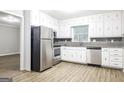 Kitchen with stainless steel appliances at 7325 Czar Pl, Riverdale, GA 30296