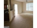 Living room with access to back patio at 2290 Nicole Dr, Hampton, GA 30228