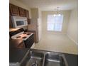Kitchen with ample counter space and a breakfast nook at 2103 Grove Way, Hampton, GA 30228