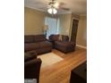 Bright living room with hardwood floors and a comfortable seating area at 4850 Lehigh Dr, Douglasville, GA 30135