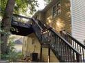 Elevated deck with stairs leading to backyard at 2734 Laurel View Dr, Snellville, GA 30039