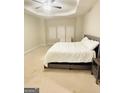 Spacious primary bedroom with carpeted floors and ample natural light at 4020 Red Canoe Bnd, Lilburn, GA 30047
