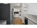 Kitchen with stainless steel appliances and wine cooler at 3060 Nw Pharr Cts # 317, Atlanta, GA 30305