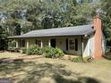 Ranch style home with covered porch and landscaped yard at 1381 Durden Rd, Rutledge, GA 30663