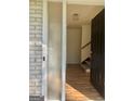 Bright entryway with hardwood floors and staircase at 4330 Cedar Valley Ln, Conley, GA 30288