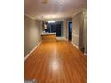 Open concept dining room with wood-look floors and kitchen access at 807 Boston Cmn, Atlanta, GA 30349