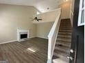 Living Room with high ceiling, fireplace, and loft at 9585 Lakeview Cir, Union City, GA 30291