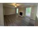 Spacious living room with fireplace and hardwood floors at 508 Wynbrooke Pkwy, Stone Mountain, GA 30087