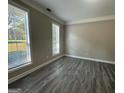Bright office with hardwood floors and window blinds at 508 Wynbrooke Pkwy, Stone Mountain, GA 30087