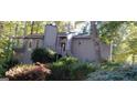 Two-story house with gray siding and a large yard at 5260 Island Dr, Stone Mountain, GA 30087